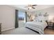 Spacious bedroom with large window and stylish bedding at 515 Mangrove Shade Cir, Apollo Beach, FL 33572