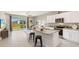 Modern kitchen with granite countertops and stainless steel appliances at 515 Mangrove Shade Cir, Apollo Beach, FL 33572