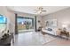 Spacious living room with sliding glass doors leading to patio at 515 Mangrove Shade Cir, Apollo Beach, FL 33572