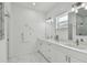 Clean bathroom with double vanity and marble floors at 524 S Grosse Ave, Tarpon Springs, FL 34689