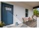 Stylish blue front door with glass accents and welcoming entryway at 524 S Grosse Ave, Tarpon Springs, FL 34689