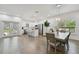Open concept kitchen with island, stainless steel appliances, and access to backyard at 524 S Grosse Ave, Tarpon Springs, FL 34689