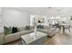 Bright and airy living room with stylish furnishings and an open floor plan at 524 S Grosse Ave, Tarpon Springs, FL 34689