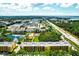 Aerial view of condo community, emphasizing its proximity to a main road and water at 5849 Park N St # 201, St Petersburg, FL 33709