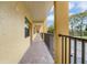 Condo hallway with view of trees at 5849 Park N St # 201, St Petersburg, FL 33709