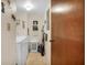 Laundry room with washer, dryer and storage at 5849 Park N St # 201, St Petersburg, FL 33709