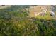 Land for sale featuring mature trees and surrounding neighborhood at 6367 Foxbrook Trl, Parrish, FL 34219