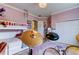 Pink bedroom with bunk beds, drum set, and musical instruments at 6367 Foxbrook Trl, Parrish, FL 34219