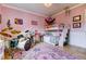 Well-lit bedroom with bunk beds, drum set, and musical themed decor at 6367 Foxbrook Trl, Parrish, FL 34219