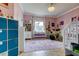 Bright bedroom with musical theme featuring drum set, bunk bed, and ample storage at 6367 Foxbrook Trl, Parrish, FL 34219