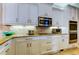 Close up of kitchen with stainless steel appliances and custom cabinetry at 6367 Foxbrook Trl, Parrish, FL 34219