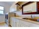 Well-lit laundry room features a sink, ample storage space, and washer and dryer at 6367 Foxbrook Trl, Parrish, FL 34219