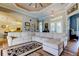 Bright living room with elegant decor, hardwood floors, and a large sectional sofa at 6367 Foxbrook Trl, Parrish, FL 34219