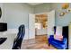 Elegant home office featuring a view into the living room, neutral paint, and decor at 6367 Foxbrook Trl, Parrish, FL 34219