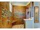 Modern tiled shower with built in bench and mosaic tile accents at 6367 Foxbrook Trl, Parrish, FL 34219