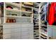 Neatly organized walk-in closet with shelving, drawers, and plenty of storage space at 6367 Foxbrook Trl, Parrish, FL 34219
