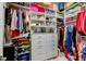 Organized walk-in closet with shelving, drawers, and ample space for storage at 6367 Foxbrook Trl, Parrish, FL 34219