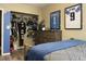 Bedroom with closet, dresser, and a double bed at 6614 Papa Guy Ln, Plant City, FL 33565