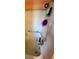 Bathroom with shower/tub combo and grab bars at 7524 Vienna Ln, Port Richey, FL 34668