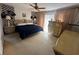 Main bedroom with a large bed and ample closet space at 7524 Vienna Ln, Port Richey, FL 34668