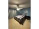 Bedroom with double bed and ceiling fan at 7524 Vienna Ln, Port Richey, FL 34668