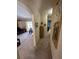 Hallway with view to living room and other rooms at 7524 Vienna Ln, Port Richey, FL 34668
