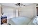 Light-filled bedroom with a queen-size bed and double closet at 8532 Kumquat Ave, Seminole, FL 33777