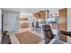Open concept dining area with wooden table and seating at 8532 Kumquat Ave, Seminole, FL 33777