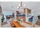 Open concept dining area with a view into the living room at 8532 Kumquat Ave, Seminole, FL 33777