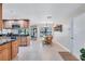 Bright dining area with wooden table and bench seating at 8532 Kumquat Ave, Seminole, FL 33777