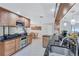 Updated kitchen with stainless steel appliances and granite counters at 8532 Kumquat Ave, Seminole, FL 33777