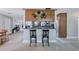 Kitchen features granite countertops and wooden cabinets at 8532 Kumquat Ave, Seminole, FL 33777