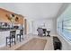 Bright kitchen features a breakfast bar and modern appliances at 8532 Kumquat Ave, Seminole, FL 33777