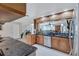 Updated kitchen with stainless steel appliances and granite counters at 8532 Kumquat Ave, Seminole, FL 33777