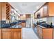 Updated kitchen with stainless steel appliances and granite counters at 8532 Kumquat Ave, Seminole, FL 33777