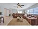 Bright and airy living room featuring a comfortable sectional sofa at 8532 Kumquat Ave, Seminole, FL 33777