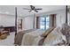 Main bedroom with a view of the pool through sliding doors at 8532 Kumquat Ave, Seminole, FL 33777