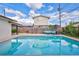 Clear blue pool reflecting a beautiful sunny sky at 8532 Kumquat Ave, Seminole, FL 33777