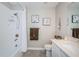 Bathroom with white vanity, shower/tub, and brown towels at 10191 Echo Dock Loop, San Antonio, FL 33576