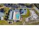 Aerial view of the community center, community pool, parking, and other neighborhood amenities at 10805 Keys Gate Dr, Riverview, FL 33579