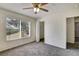 Bedroom featuring a large window, closet, and ceiling fan at 10805 Keys Gate Dr, Riverview, FL 33579