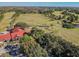 A stunning aerial view showcasing the golf course and community amenities at 10805 Keys Gate Dr, Riverview, FL 33579