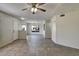 Spacious living room with tile floors and ceiling fan at 10805 Keys Gate Dr, Riverview, FL 33579