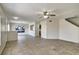 Open living area with tile floors, showing kitchen and dining areas at 10805 Keys Gate Dr, Riverview, FL 33579