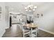 Open-concept kitchen and eat-in dining area with seamless flow to living room at 11125 Callisia Dr, Odessa, FL 33556