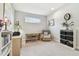 Comfortable home office with natural light, desk, chair, and storage at 11125 Callisia Dr, Odessa, FL 33556
