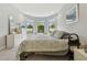 Bright bedroom with large windows, carpeting and neutral paint at 11125 Callisia Dr, Odessa, FL 33556