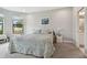 Spacious bedroom with carpeting, neutral paint and natural light at 11125 Callisia Dr, Odessa, FL 33556