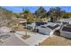 House with solar panels and driveway, aerial view at 11828 Bingham Dr, Port Richey, FL 34668