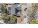House with solar panels and pool, top-down view at 11828 Bingham Dr, Port Richey, FL 34668